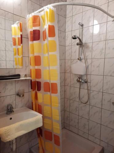 a bathroom with a shower and a sink at Pension Horvath in Sankt Kanzian