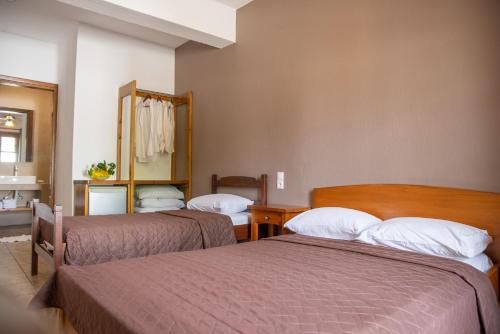 Letto o letti in una camera di Hotel Cleopatra
