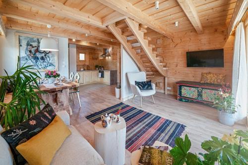 TV a/nebo společenská místnost v ubytování Osada Gąsienica Centrum Zakopane