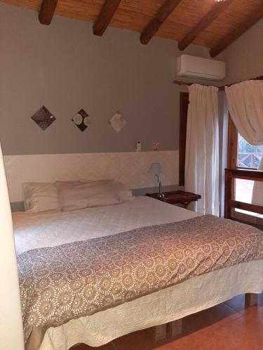 Ένα ή περισσότερα κρεβάτια σε δωμάτιο στο Guesthouse El Tata