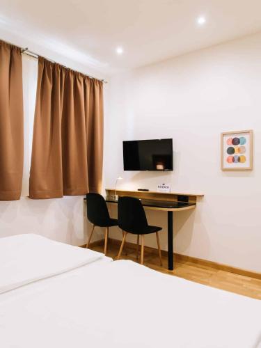 Apartman Diófa tesisinde bir televizyon ve/veya eğlence merkezi
