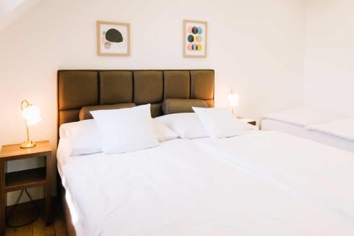 Postel nebo postele na pokoji v ubytování Apartman Diófa