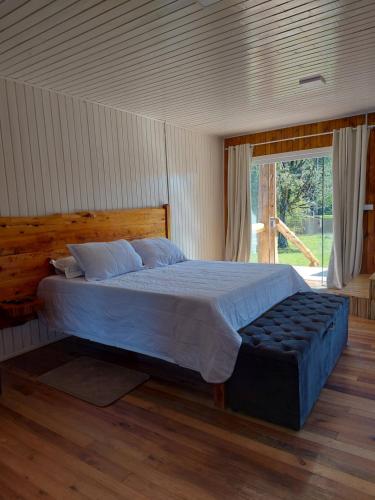 Cama ou camas em um quarto em Pousada Recanto do Lago