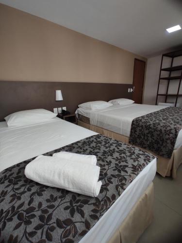 Ένα ή περισσότερα κρεβάτια σε δωμάτιο στο Hotel Annamar Premium
