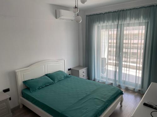 En eller flere senge i et værelse på Sophia Residence-Casa del Mar