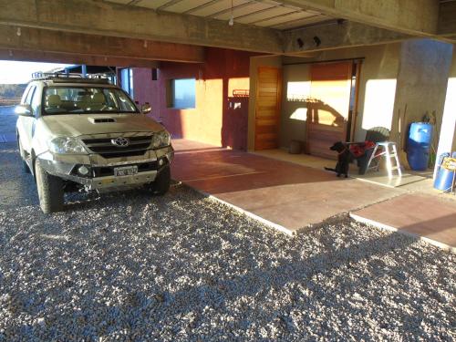 a car parked in front of a house at Base Manzano in Tunuyán