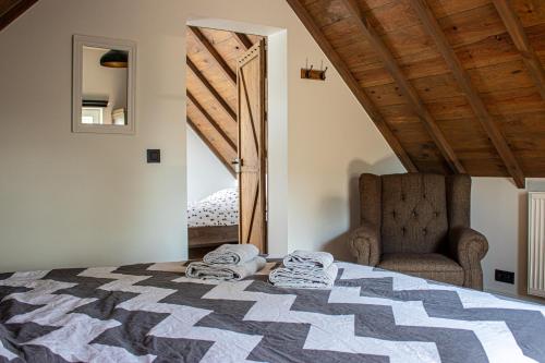 Ένα ή περισσότερα κρεβάτια σε δωμάτιο στο De Lammersdamhoeve