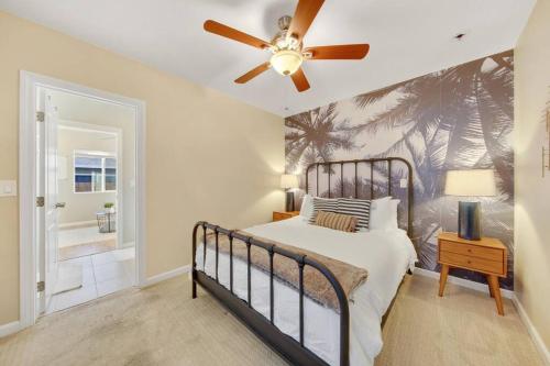 a bedroom with a bed and a ceiling fan at Trendy San Diego Home with Outdoor Space in San Diego