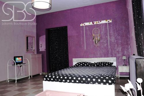 Postel nebo postele na pokoji v ubytování Salamis Boutique Studio