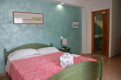 Ліжко або ліжка в номері Il Capriccio Guesthouse
