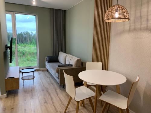 Posedenie v ubytovaní Ukiel Park Green Apartament