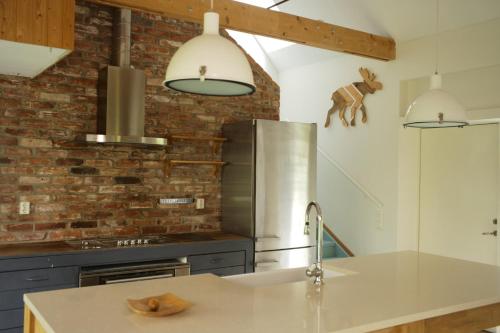 Kuchyň nebo kuchyňský kout v ubytování Gransäng Loft House