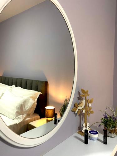 Llit o llits en una habitació de Veranda Apartment