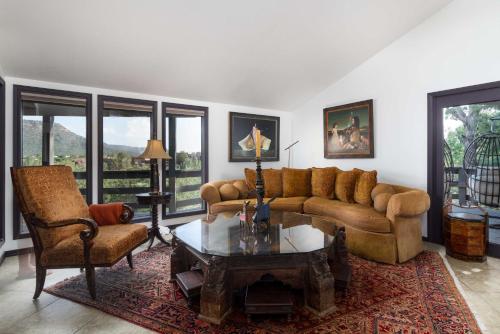 a living room with a couch and chairs and a table at Outdoor Entertaining Space Sedona Mtn-View Home in Sedona
