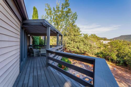 a porch of a house with a wooden deck at Outdoor Entertaining Space Sedona Mtn-View Home in Sedona