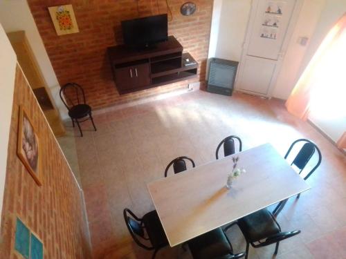 an overhead view of a dining room with a table and chairs at Altas Mareas 2 in Las Grutas