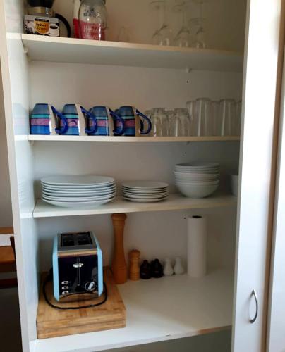 Una cocina o cocineta en Cosy On Till