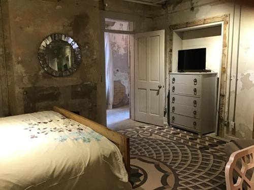 Ένα ή περισσότερα κρεβάτια σε δωμάτιο στο New Orleans Premier Rentals