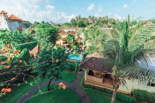 an aerial view of a resort with a swimming pool at Pondok Kutuh Guest House in Ubud