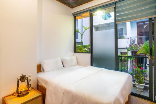 Giường trong phòng chung tại KenKeSu House-Nice third Aprt-2BRs- Free airport pick up from 2 nights