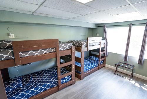 Ένα ή περισσότερα κρεβάτια σε δωμάτιο στο California Dreams Hostel - Ocean Beach