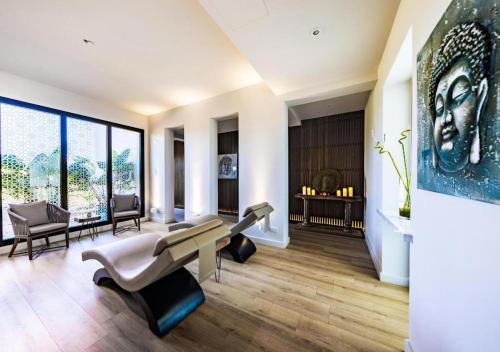 Χώρος καθιστικού στο Relaxing Beachfront Apartment