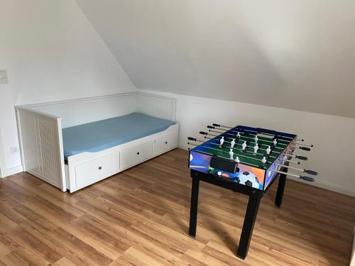 Kemudahan pingpong di Ferienhaus Klaus-Groth atau berdekatan