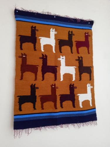 a painting of silhouettes of horses on a wall at Ecolodge Casa del Montañista in Huaraz