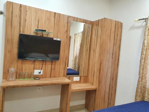 A television and/or entertainment center at Stay Court (Business Class Hotel)