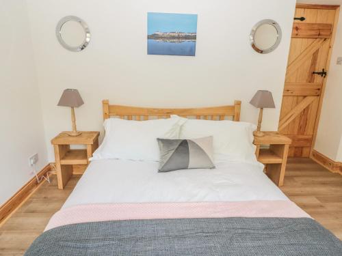 En eller flere senge i et værelse på 24 Hauxley Links