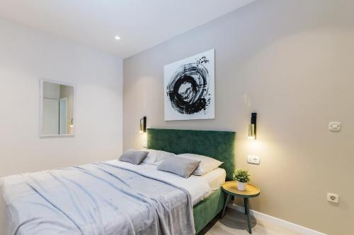 Posteľ alebo postele v izbe v ubytovaní Apartment Zulijani A4