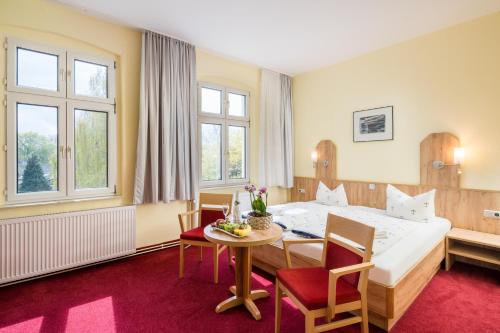 Postel nebo postele na pokoji v ubytování Hotel Seestern