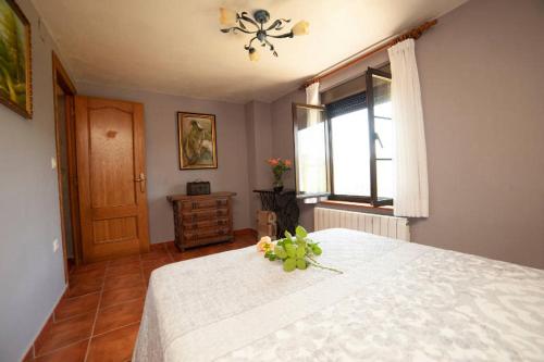 Ένα ή περισσότερα κρεβάτια σε δωμάτιο στο Casa Campu 1