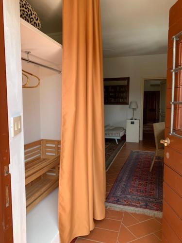 Un pat sau paturi într-o cameră la Il Montelletto