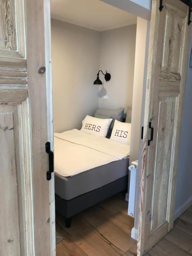 Posteľ alebo postele v izbe v ubytovaní Apartament Bulvar Starówka