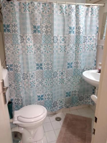 A bathroom at Perikleous Apartment