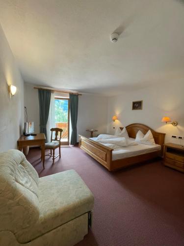 Posteľ alebo postele v izbe v ubytovaní Hotel Larch