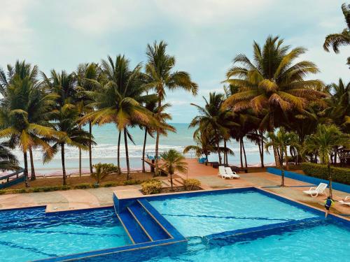 The swimming pool at or close to Suites de Lujo Playa Azul