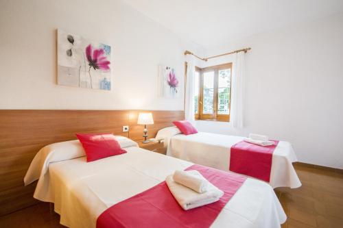 Postel nebo postele na pokoji v ubytování Miramar I by Sonne Villas
