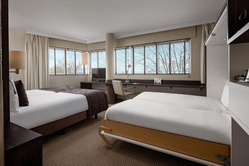 Een bed of bedden in een kamer bij WestCord Art Hotel Amsterdam 4 stars