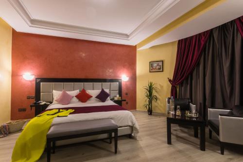 Ein Bett oder Betten in einem Zimmer der Unterkunft Hotel Meriem Marrakech