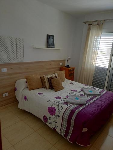 מיטה או מיטות בחדר ב-Habitación Privada May