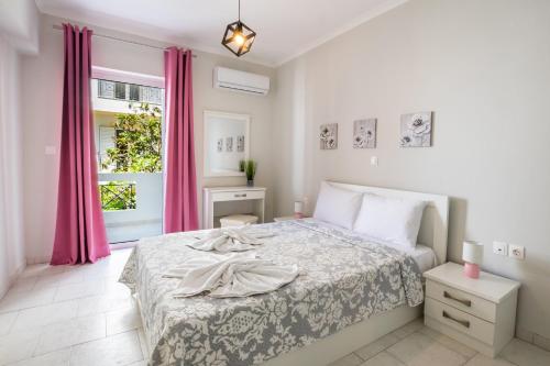 Postel nebo postele na pokoji v ubytování Lilis Apartment 3