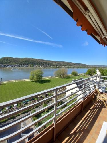 a balcony with a view of the water at Rheinapartment 8 in Bad Hönningen