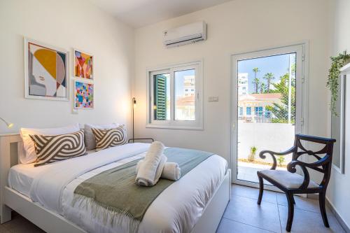 Ένα ή περισσότερα κρεβάτια σε δωμάτιο στο Spacious 3-Bedroom House in Larnaca