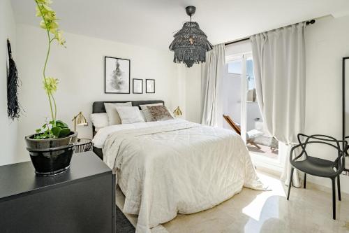 Кровать или кровати в номере Casa Royal by Roomservices AR23