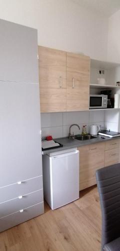 Dapur atau dapur kecil di Luna Apartments