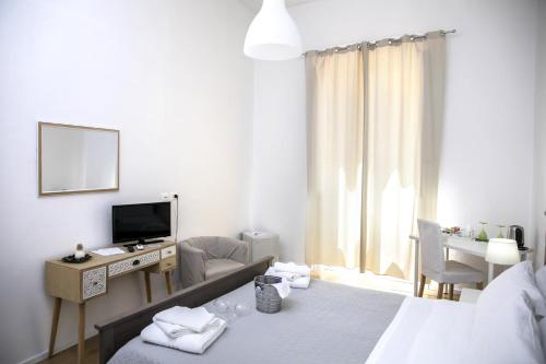 Postel nebo postele na pokoji v ubytování B&B Barone Sieri Pepoli