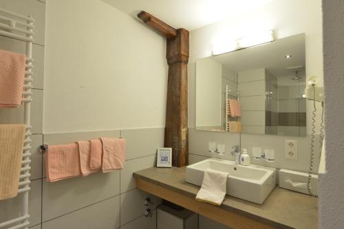 Vonios kambarys apgyvendinimo įstaigoje Hotel Garni Brugger