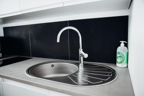 Virtuvė arba virtuvėlė apgyvendinimo įstaigoje appartement neuf, moderne et confortable!